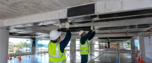 Aplikasi carbon fiber laminate pada pelat lantai beton existing untuk peningkatan kapasitas ruang