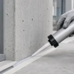 Aplikasi TOA PU Sealant pada sambungan elastis beton dan detail frame bangunan
